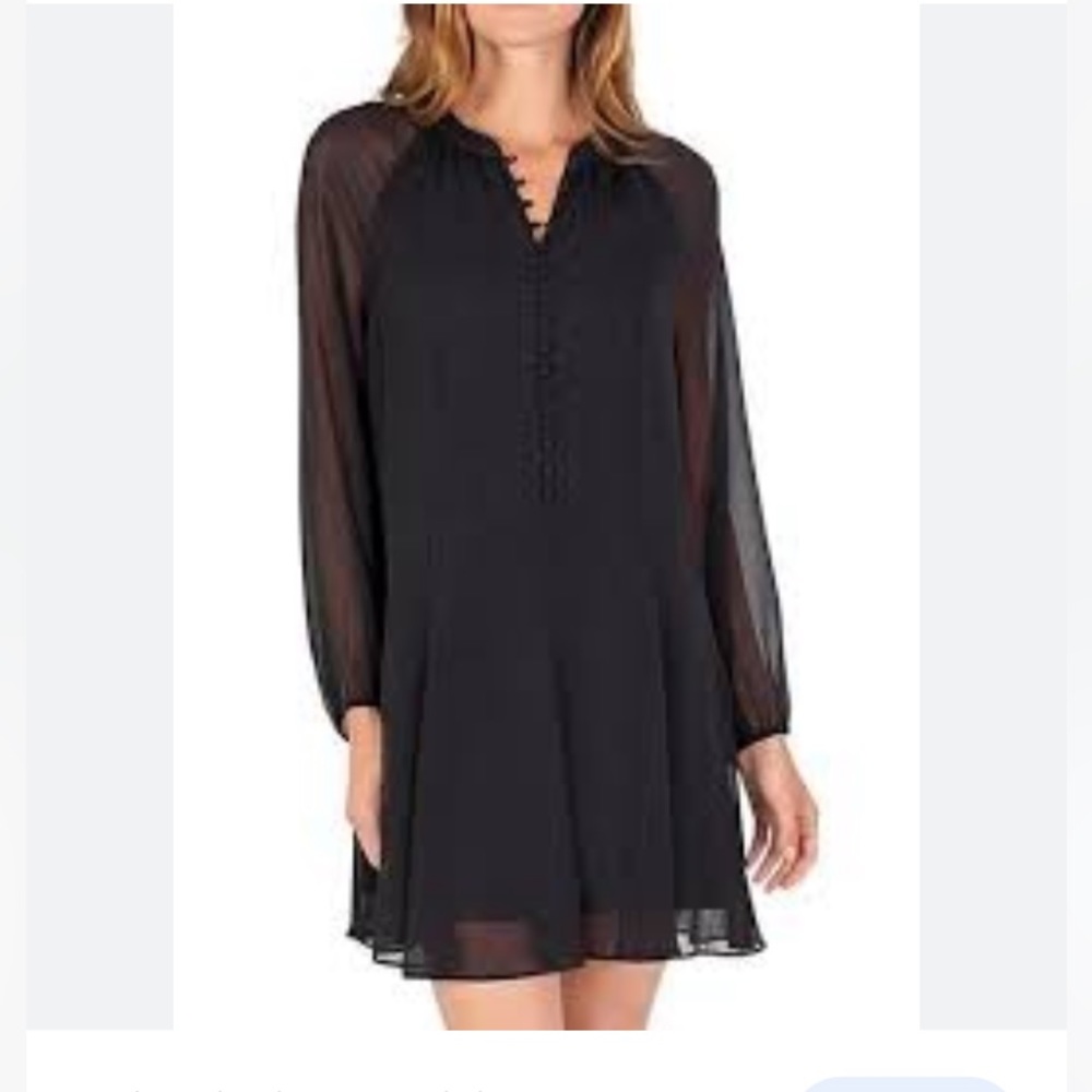 Joie from Neiman’s gorgeous black dress with sheer sleeves and sheer at bottom.